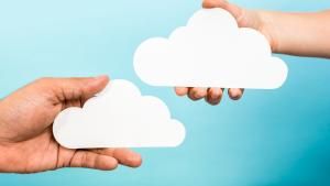 saas company portrayed as hands holding clouds