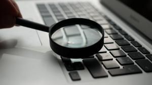 magnifying glass on laptop